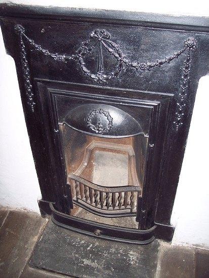 Appraisal: A pair of Victorian cast iron fire surrounds cm wide