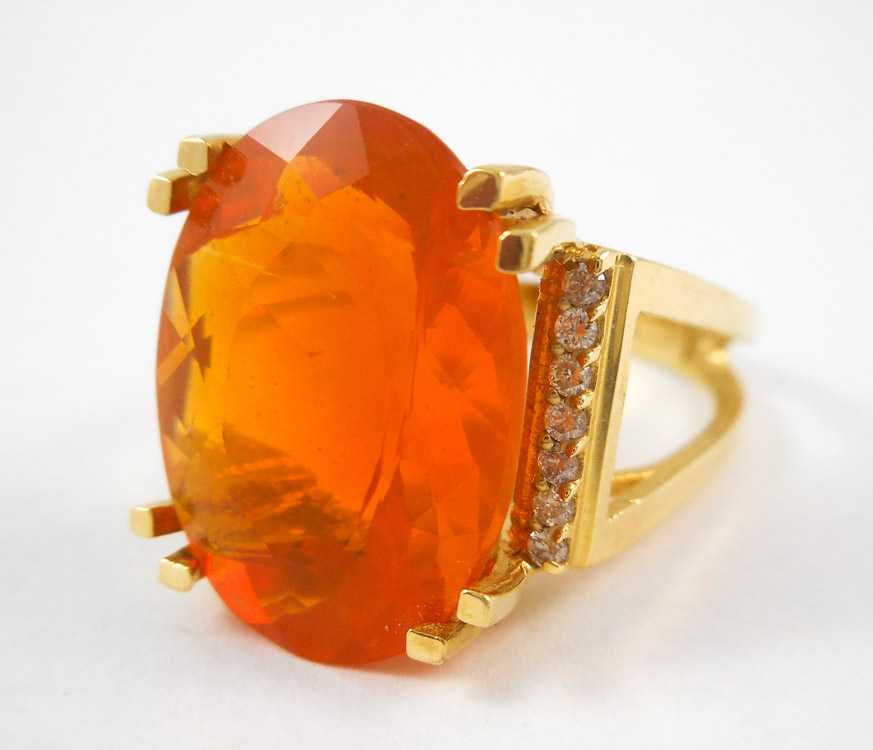 Appraisal: FIRE OPAL DIAMOND AND FOURTEEN KARAT GOLD RING with seven