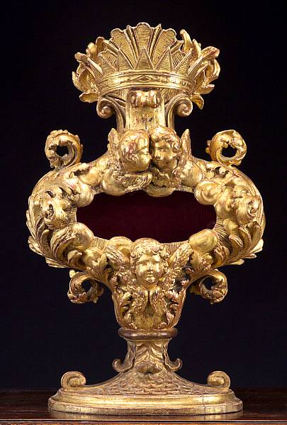 Appraisal: An Italian Baroque carved giltwood reliquary th century The waisted