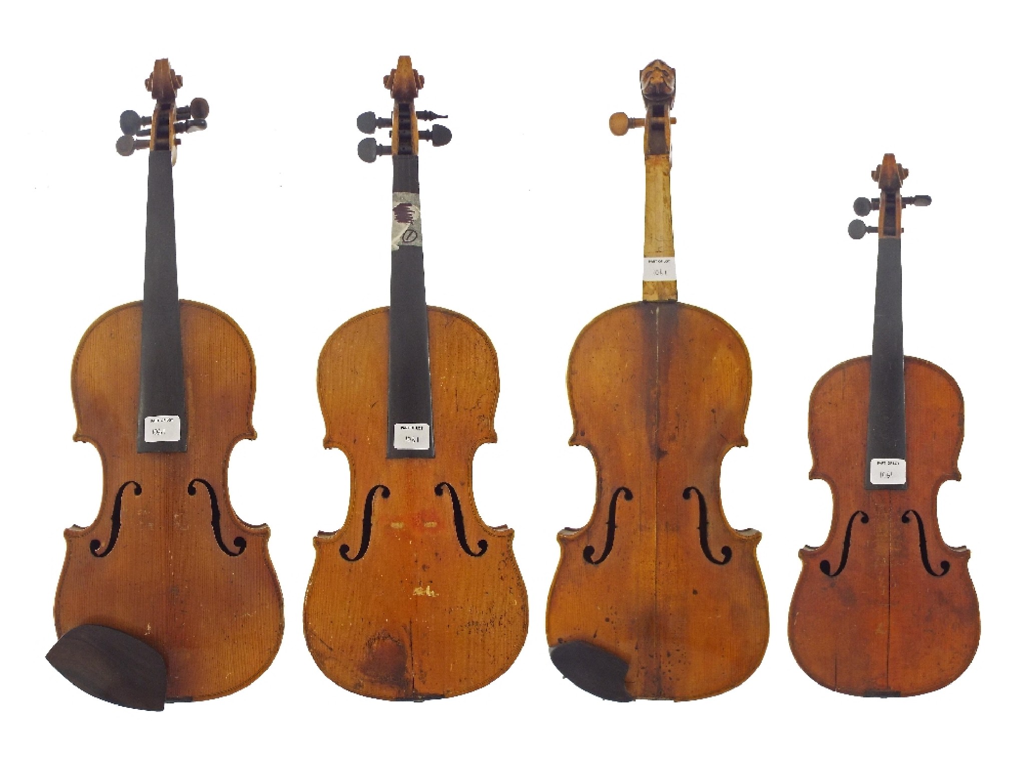 Appraisal: Four old violins in need of restoration