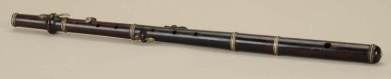 Appraisal: American Rosewood Flute Description th Century With six nickel silver