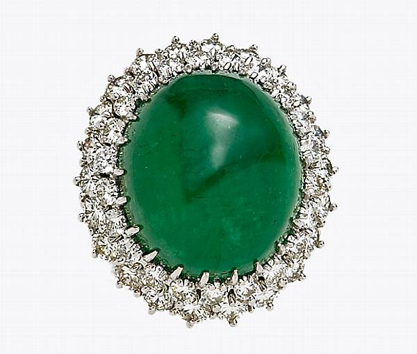 Appraisal: An emerald diamond and fourteen karat white gold ring estimated