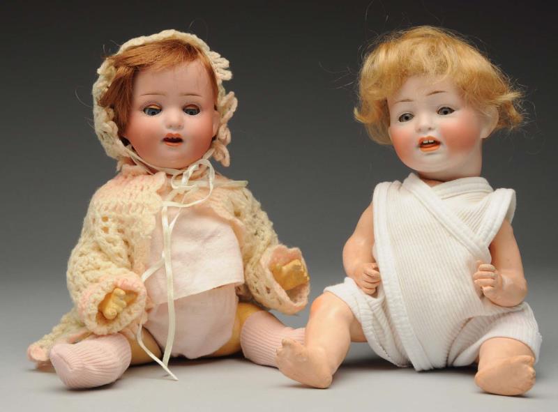 Appraisal: Lot Of German Baby Dolls Both with bisque socket heads