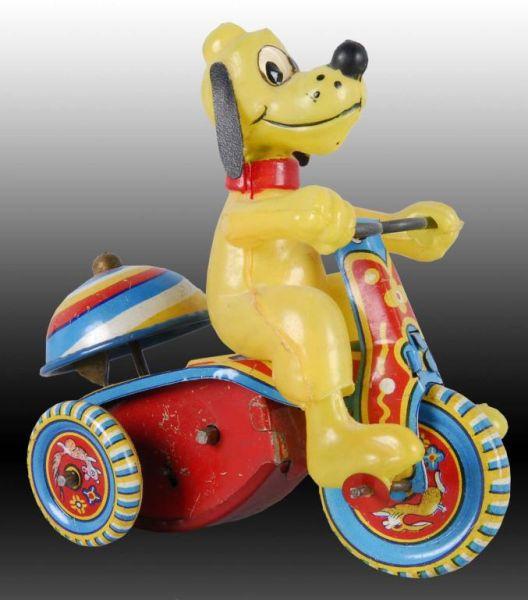 Appraisal: Walt Disney Linemar Pluto Tricycle Toy Description Original box Wind-up