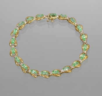 Appraisal: A Ladies' Diamond and Emerald Bracelet k yellow gold articulated