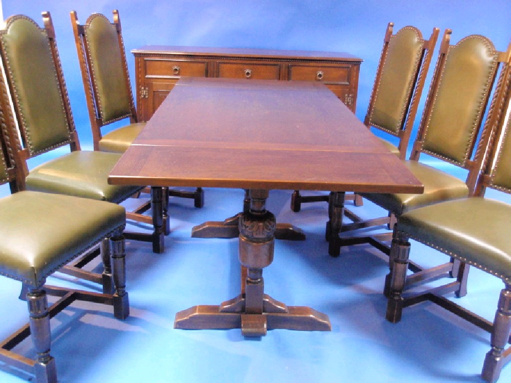 Appraisal: A set of six oak dining chairs with high padded