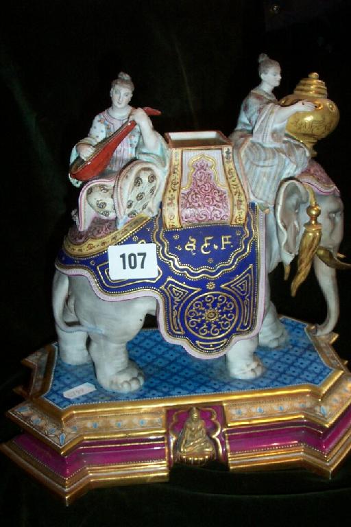 Appraisal: A th century continental bisque figure of an elephant wearing