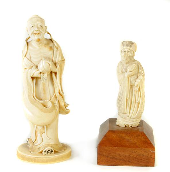 Appraisal: Two Japanese ivory figures of Chinese immortals th Century larger