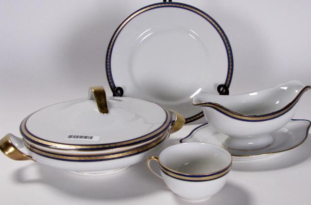 Appraisal: Partial set of Czechoslovakian porcelain dinnerware white with cobalt and