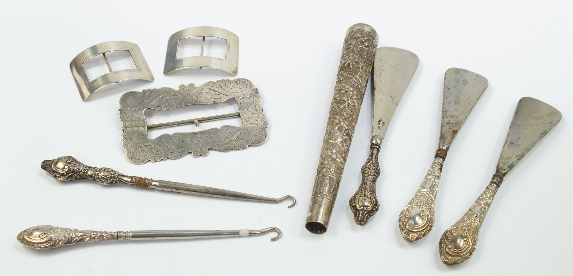 Appraisal: A group of Victorian and later silver handled shoe horns