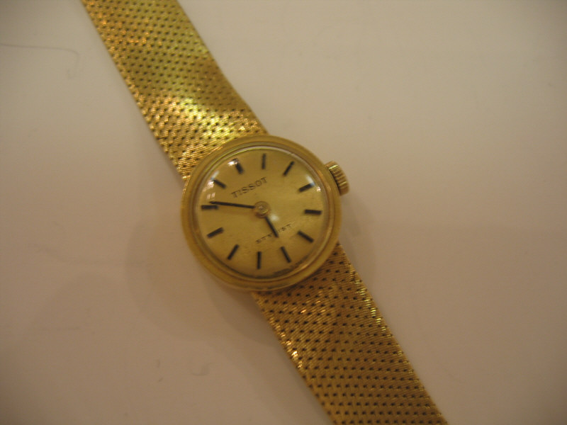 Appraisal: GOLD WATCH k yellow gold lady's Swiss Tissot watch with