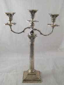 Appraisal: A silver three light candelabrum the Corinthian column rising from