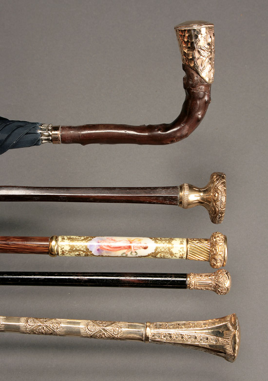 Appraisal: Group of Four Gilt Filled Mounted Parasols a Walking Stick