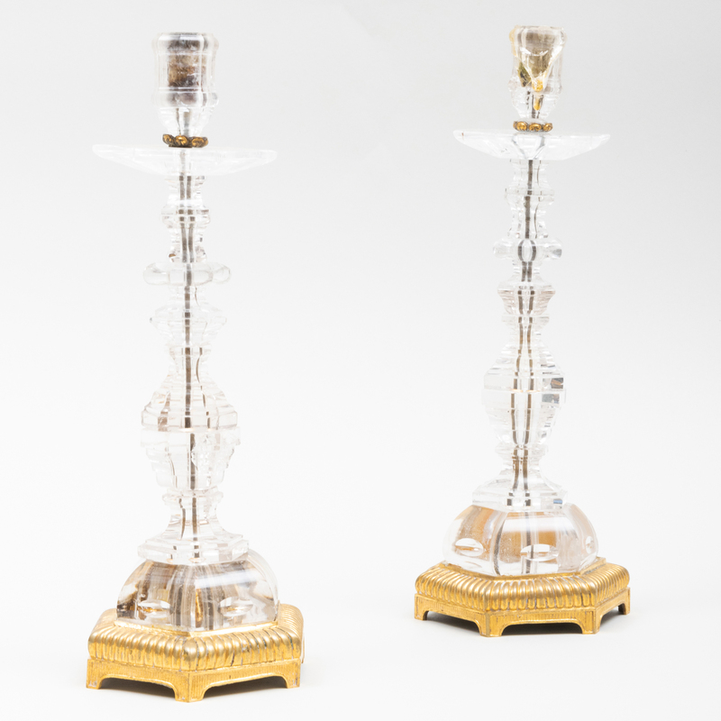 Appraisal: NEAR PAIR OF CONTINENTAL GILT-BRONZE-MOUNTED ROCK-CRYSTAL CANDLESTICKS POSSIBLY FLEMISH in