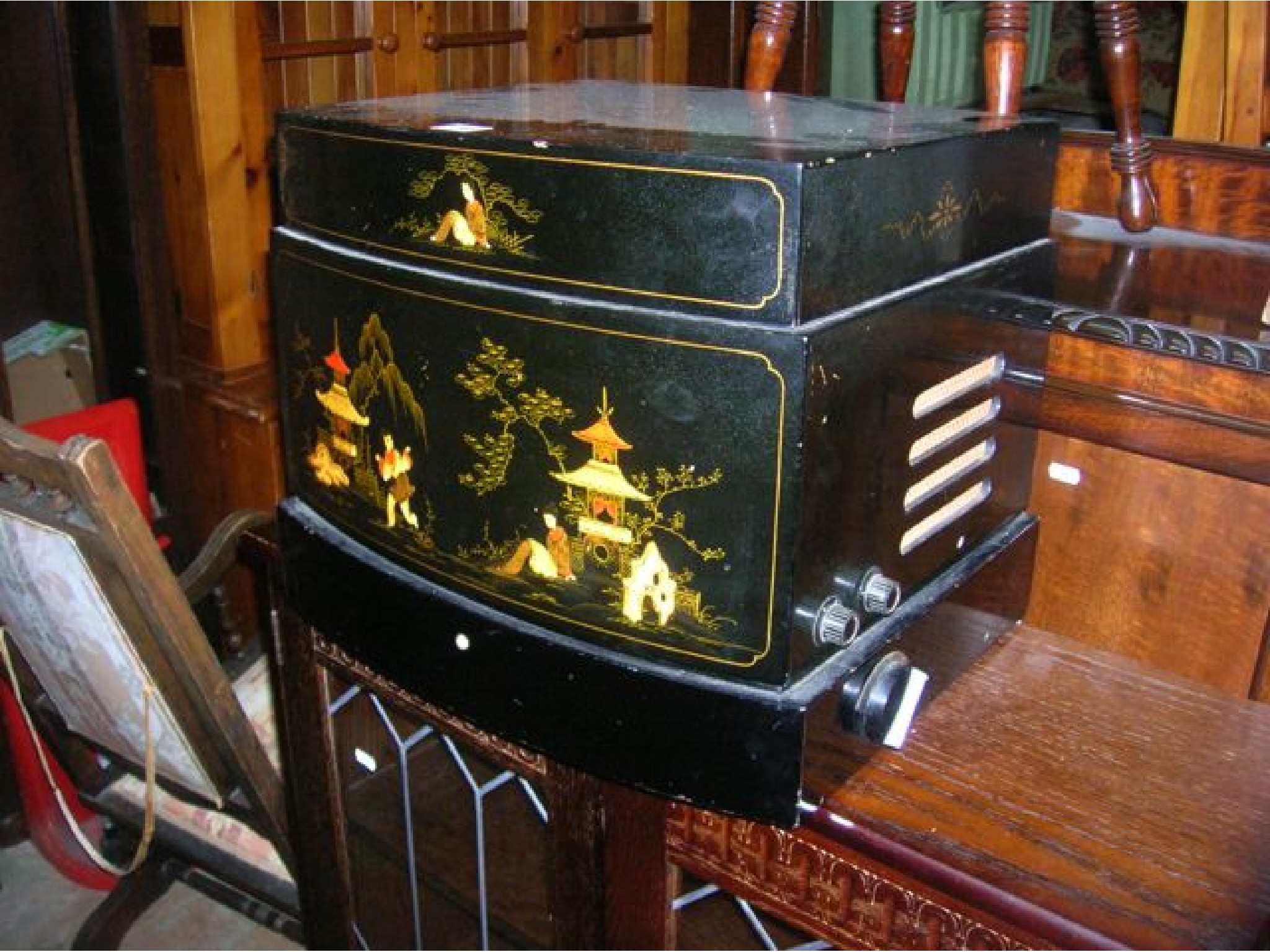 Appraisal: A vintage Pye mains record player with decorative chinoiserie case