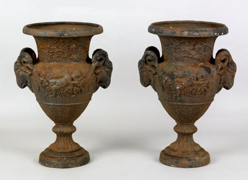 Appraisal: Pair of cast iron garden urns late th c the