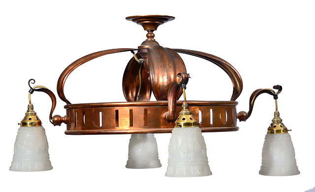 Appraisal: A large Art Nouveau hanging copper ceiling light with four