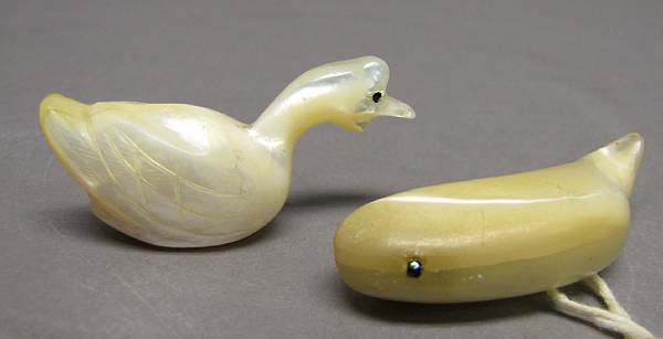 Appraisal: Two mother-of-pearl netsuke The first of a duck and the