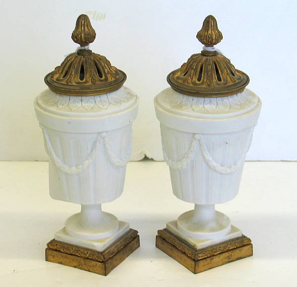 Appraisal: A pair of Niderviller bisque porcelain and gilt bronze mounted