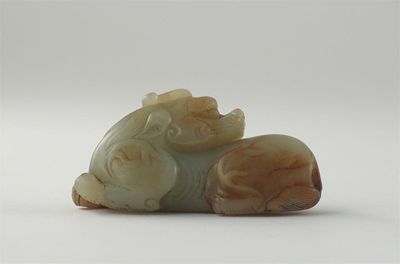 Appraisal: A Chinese jade carving of a recumbent kylin the stone