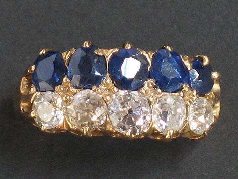 Appraisal: A SAPPHIRE AND DIAMOND ETERNITY RING set in two rows