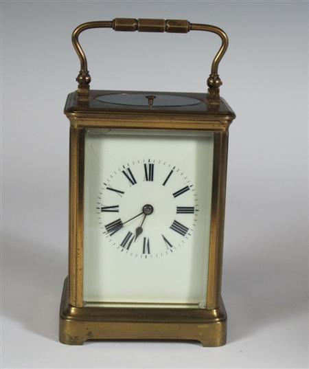 Appraisal: A brass repeater carriage clock the cream dial with black