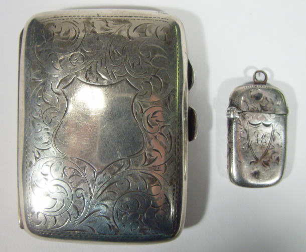 Appraisal: Victorian silver cigarette case and vesta with chased decoration