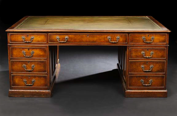 Appraisal: George III-Style Walnut Partner's Desk the rectangular top above a