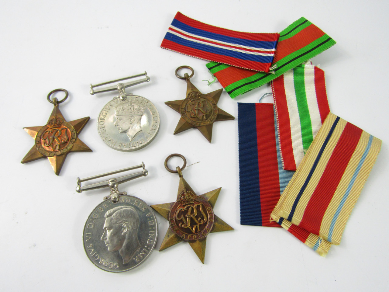 Appraisal: A group of WWII medals together with an issue box