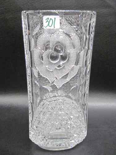 Appraisal: ARTISAN CLEAR CUT GLASS VASE heavily cut with asymmetric design