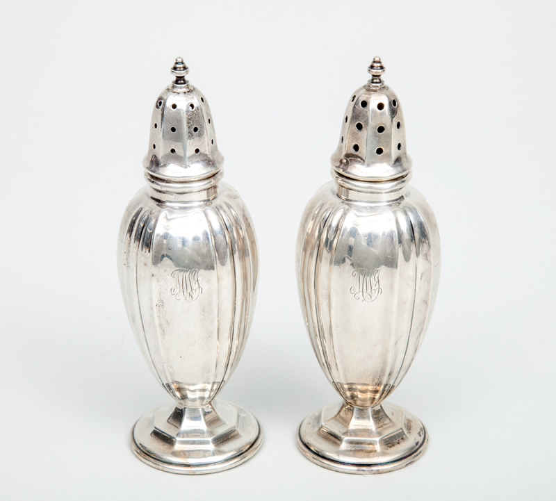 Appraisal: PAIR OF DOMINICK HAFF WEIGHTED SILVER SALT AND PEPPER CASTERS