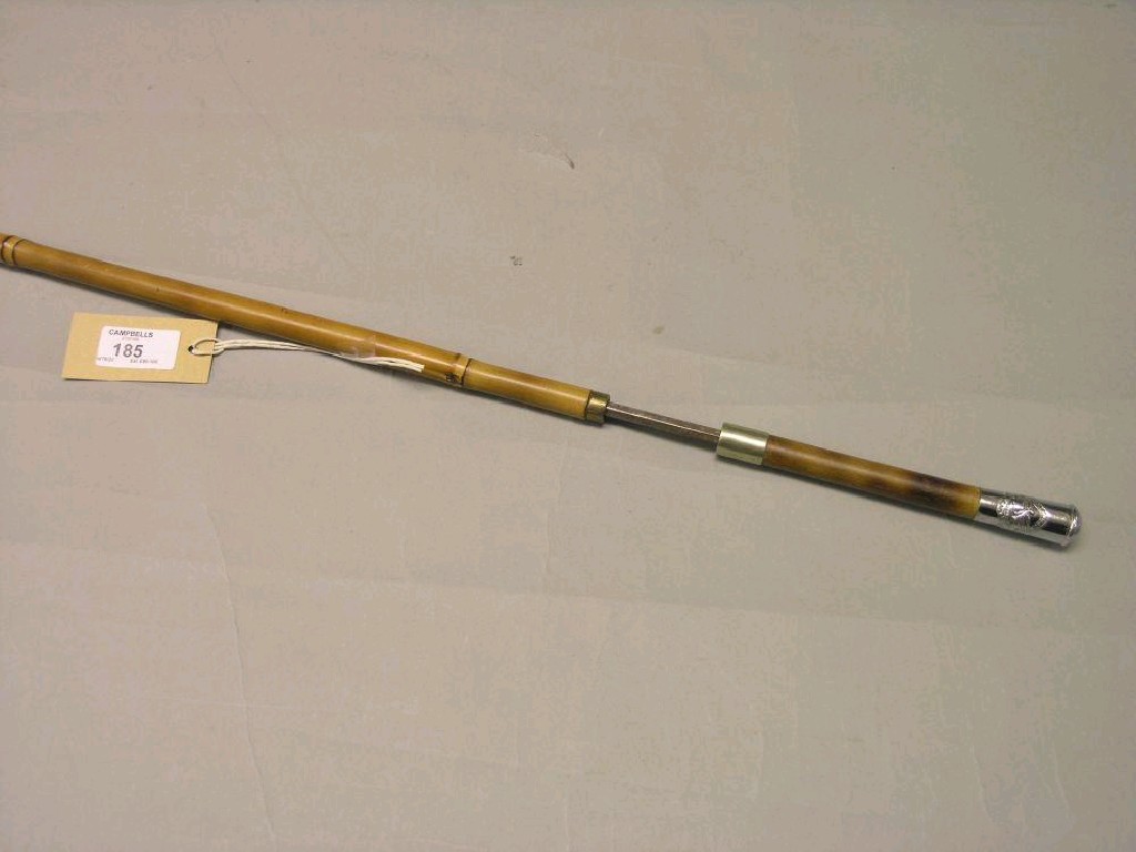 Appraisal: A Northern Rhodesia Police swordstick bamboo with crested white metal