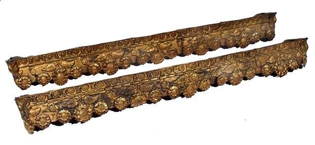 Appraisal: A PAIR OF GILT METAL AND WOODEN PELMETS with allover