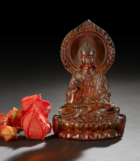 Appraisal: Chinese Carved Clarified Amber Figure of Buddha th century carved