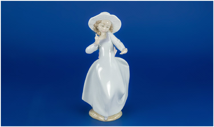 Appraisal: Lladro figure 'girl looking at her hand' no inches in