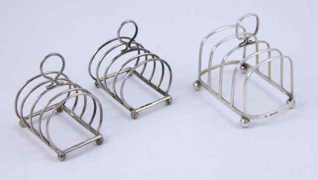 Appraisal: A pair of silver toast racks S S and H