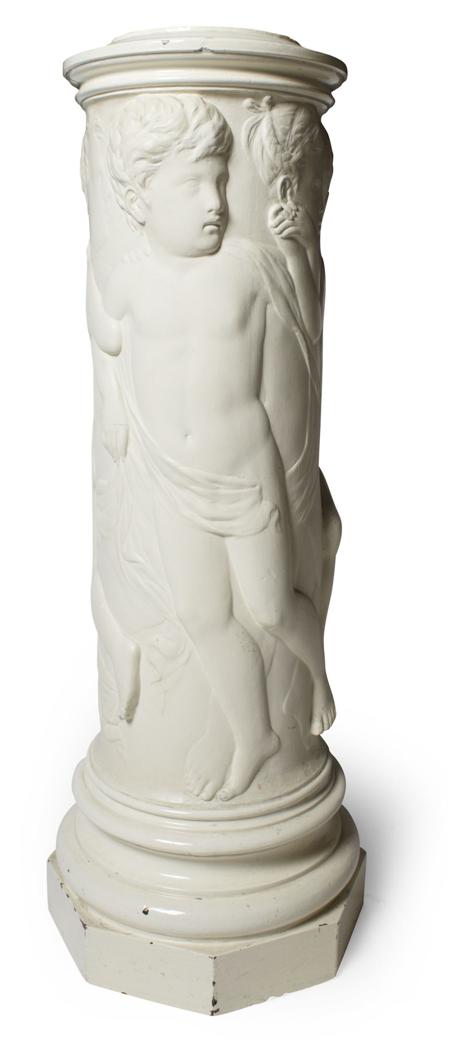 Appraisal: A white plaster plinth of cylindrical form depicting young boys