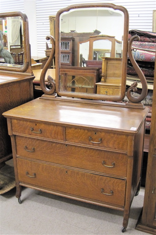 Appraisal: LATE VICTORIAN OAK DRESSER WITH MIRROR American c the low