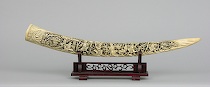 Appraisal: Carved Tusk on Stand ca early th Century Carved tusk