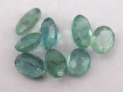 Appraisal: Eight loose polished emeralds approx carats total