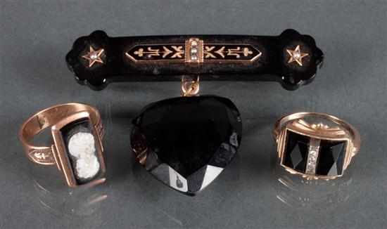 Appraisal: Group of Victorian onyx jewelry including rose gold cameo ring