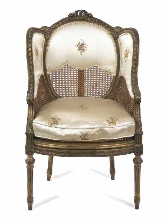 Appraisal: A Louis XVI Style Giltwood Fauteuil the shaped floral carved