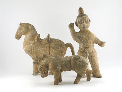 Appraisal: Three Chinese pottery figures of a standing horse an attendant