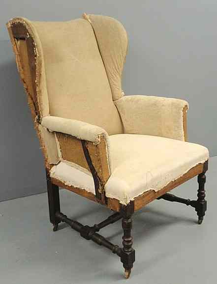 Appraisal: Sheraton mahogany wing chair c with turned stretcher base and