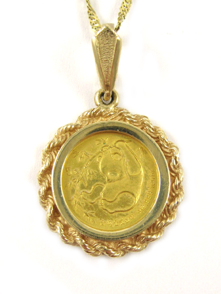 Appraisal: GOLD COIN AND FOURTEEN KARAT GOLD PENDANT NECKLACE suspended on