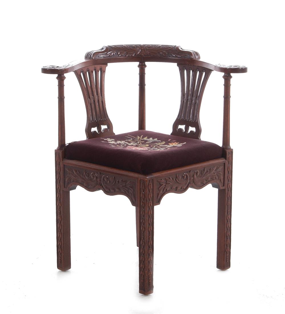 Appraisal: Chippendale style carved mahogany corner chair circa BH SH W