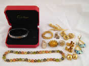 Appraisal: A quantity of costume and silver jewellery including a bracelet