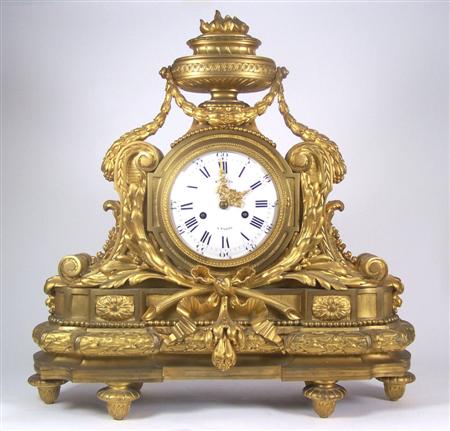 Appraisal: A th century gilt bronze mantel clock In the Louis