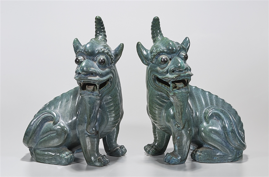 Appraisal: Pair of Chinese glazed porcelain qilin figures x x each