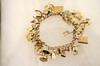 Appraisal: BRACELET - K gold charm bracelet with twenty-five charms including